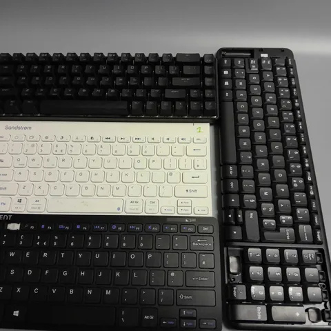LOT OF 4 ASSORTED WIRELESS KEYBOARDS TO INCLUDE SANSDTROM AND ADVENT
