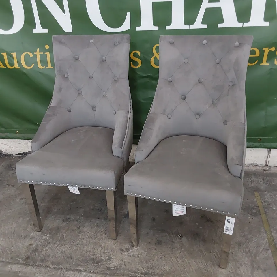 PAIR OF UPHOLSTERED BUTTONED RING BACK DINING CHAIRS STUDDED DETAIL ON SILVER LEGS