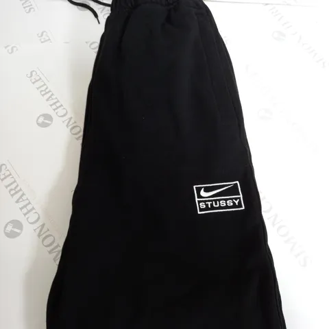 NIKE STUSSY LOGO FLEECED TRACKSUIT BOTTOMS SIZE M