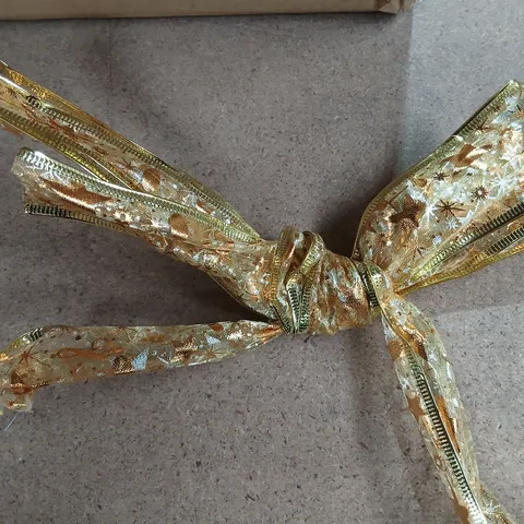 APPROXIMATELY 24 SETS OF TWO LIGHT UP RIBBONS GOLD