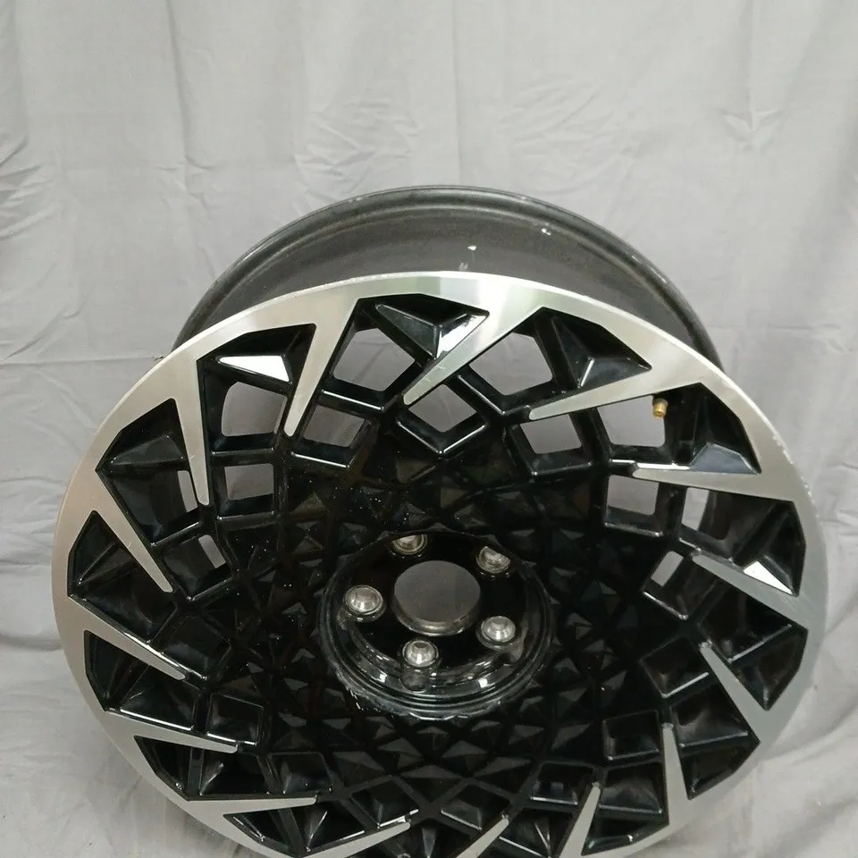 ALLOY WHEEL RIM – BLACK WITH GEOMETRIC CUT-OUT SPOKES - MODEL UNSPECIFIED