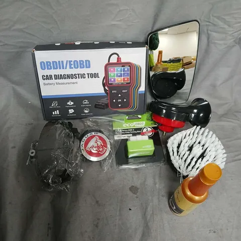 APPROXIMATELY 12 ASSORTED VEHICLE PARTS & ACCESSORIES TO INCLUDE CAR DIAGNOSTIC TOOL, WING MIRROR, ECO OBD2 ECONOMY CHIP TUNING BOX, ETC