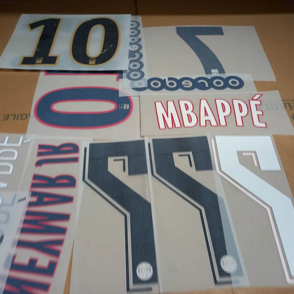 LOT OF ASSORTED FOOTBALL SHIRT IRON ON DECALS