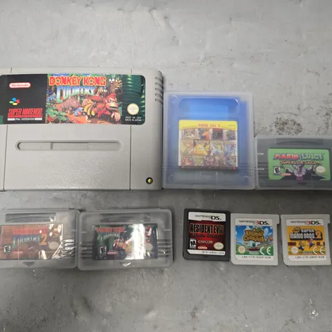 8 X ASSORTED CARTRIDGE VIDEO GAMES TO INCLUDE DONKEY KONG, RESIDENT EVIL, ANIMAL CROSSING ETC 