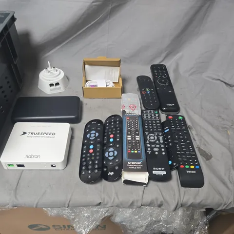 APPROXIMATELY 15 ASSORTED TV REMOTES AND CABLES