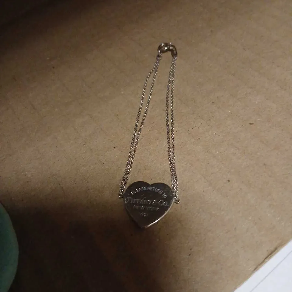 TIFFANY & CO. HEART PENDANT IN STERLING SILVER (925)