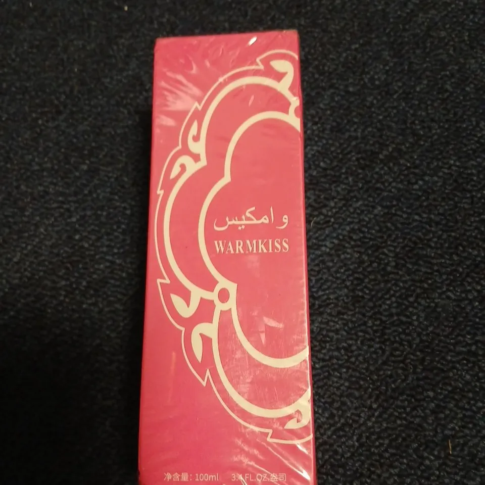 BOXED AND SEALED WARMKISS 100ML