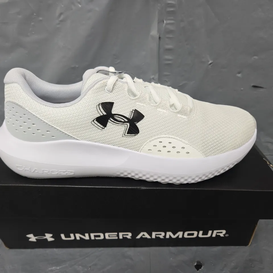 BOXED PAIR OF UNDER ARMOUR CHARGED SURGE 4 TRAINERS IN WHITE - UK 10