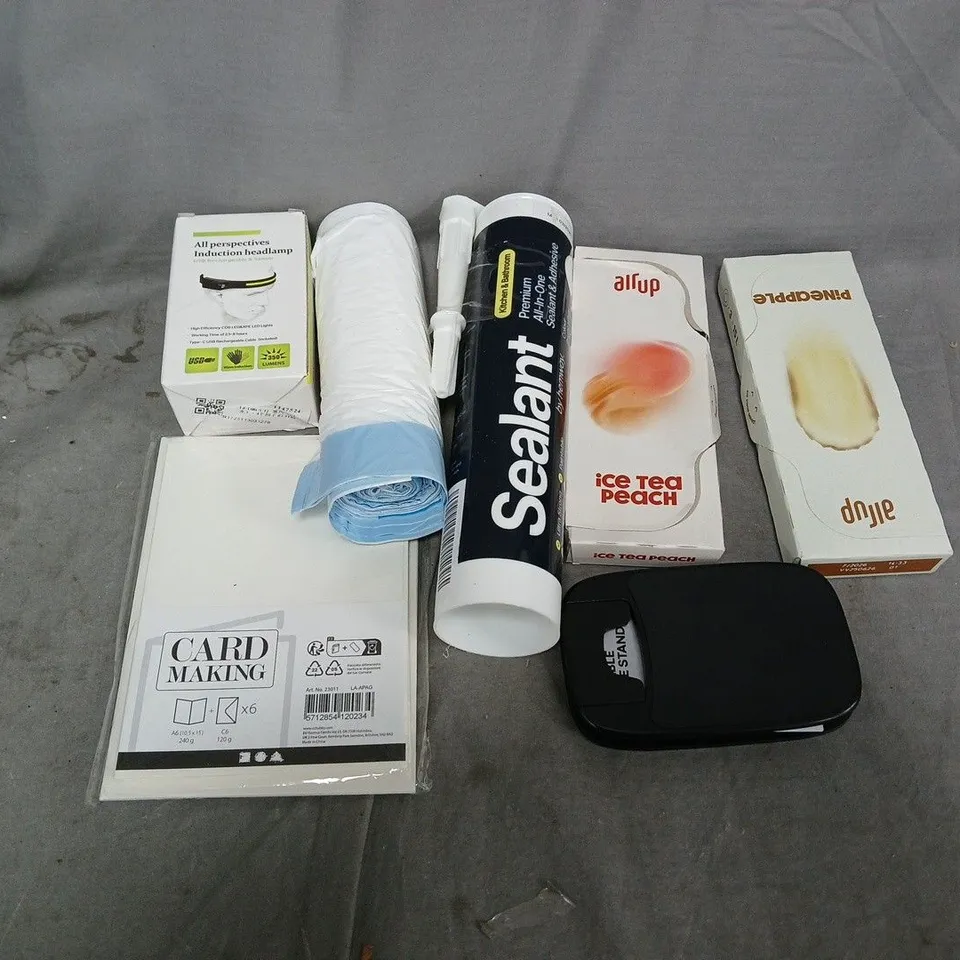 APPROXIMATELY 15 ASSORTED HOUSEHOLD ITEMS TO INCLUDE INDUCTION LAMP, AIR PODS, SEALANT, ETC