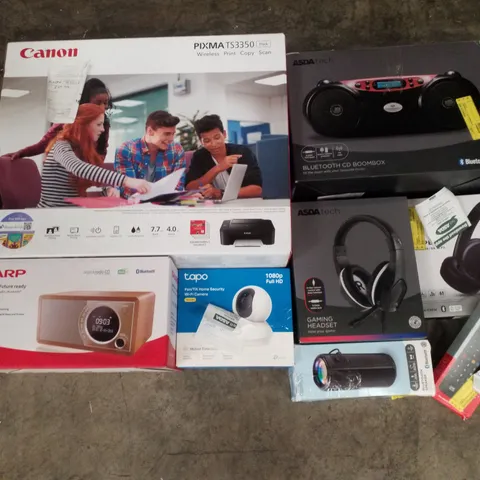 PALLET CONTAINING ASSORTED ELECTRICAL RETURNS INCLUDING CANON PIXMA TS3350 PRINTER, SHARP DIGITAL RADIO, PAN/TILT HOME SECURITY WIFI CAMERA, GAMING HEADSET, UNIVERSAL REMOTE & BLUETOOTH SPEAKERS