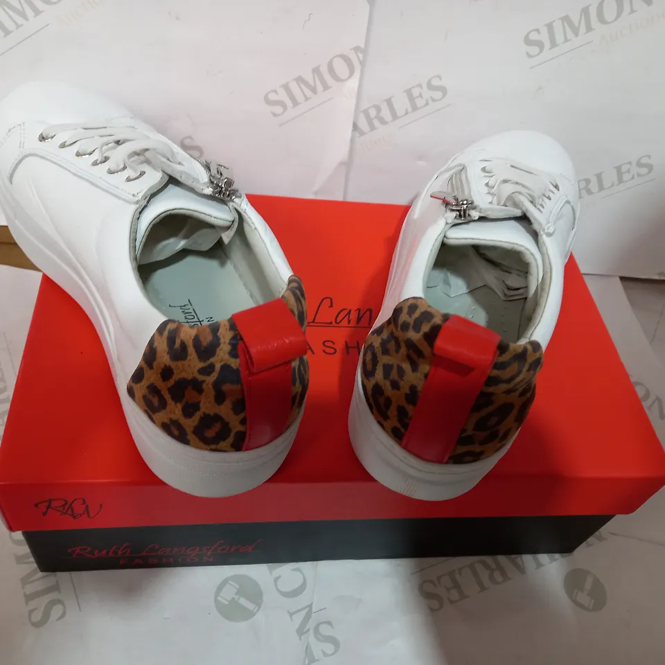 BOXED PAIR OF RUTH LANGSFORD WHITE/ANIMAL PRINT TRAINERS - SIZE 6