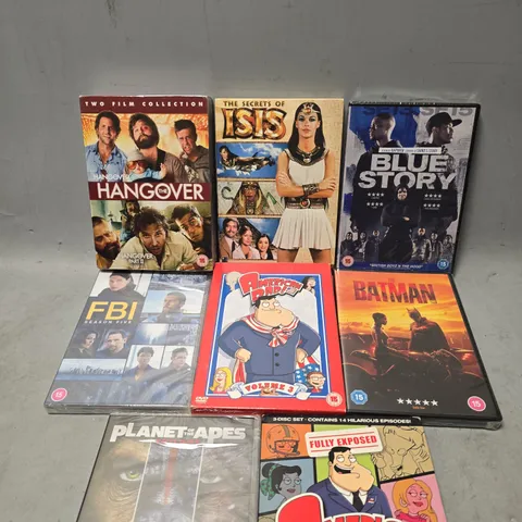 TOTE OF APPROXIMATELY 14 ASSORTED DVD'S TO INCLUDE - THE SECRETS PF ISIS , THE HANGOVER , THE BATMAN ETC
