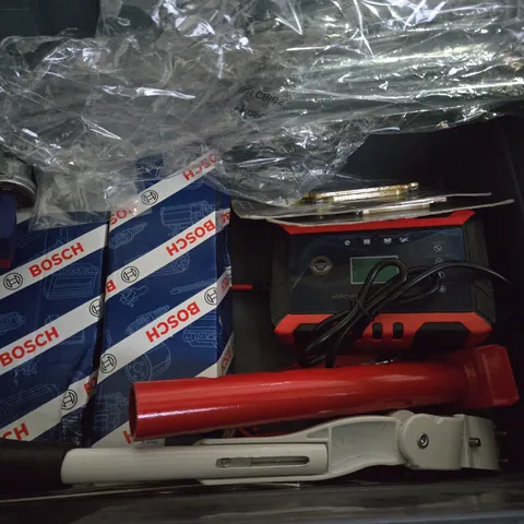 box of assorted car items to include battery charger - kick stand 