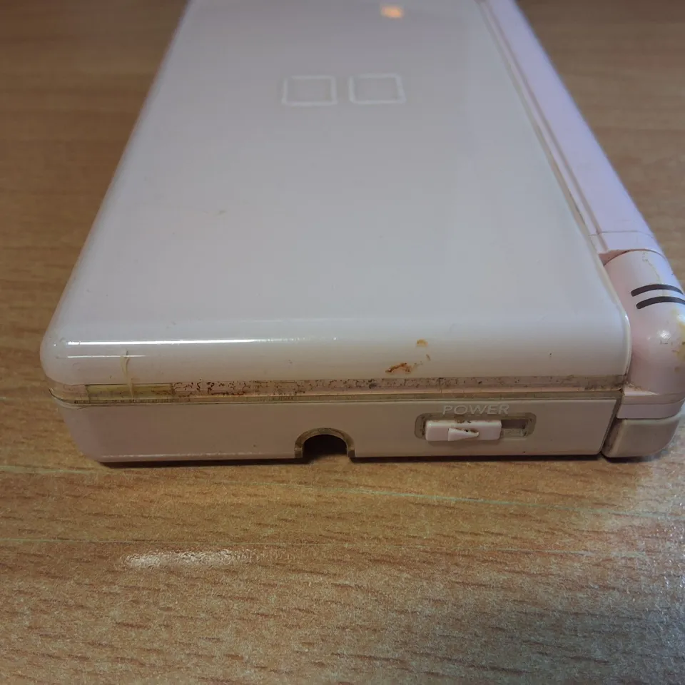 NINTENDO SWITCH DS LITE WITH CARRY CASE, PENS AND 6 GAMES