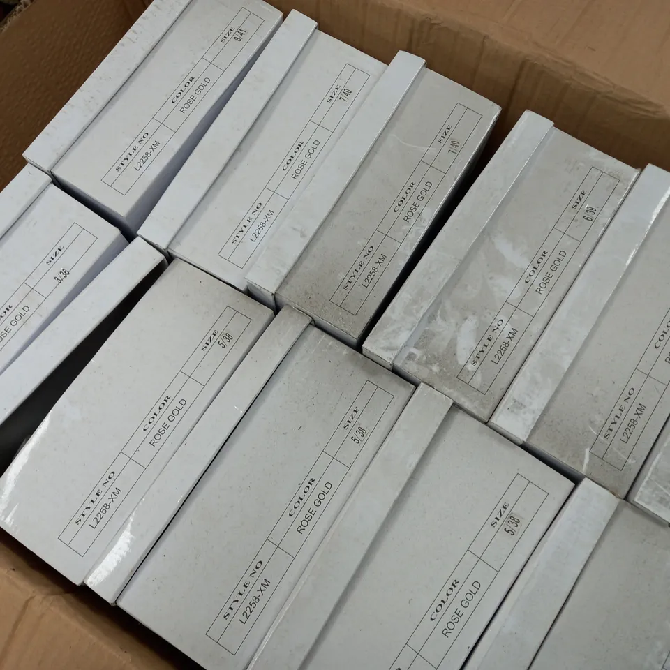 APPROXIMATELY 12 BOXED PAIR OF ANNE MICHELLE OPEN TOE HIGH HEELED PLATFORM SHOES IN ROSE GOLD TO INCLUDE SIZES 3, 5, 6, 7 