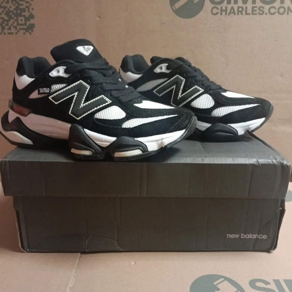 BOXED PAIR OF NEW BALANCE 9060 TRAINERS BLACK/WHITE SIZE UK 4.5