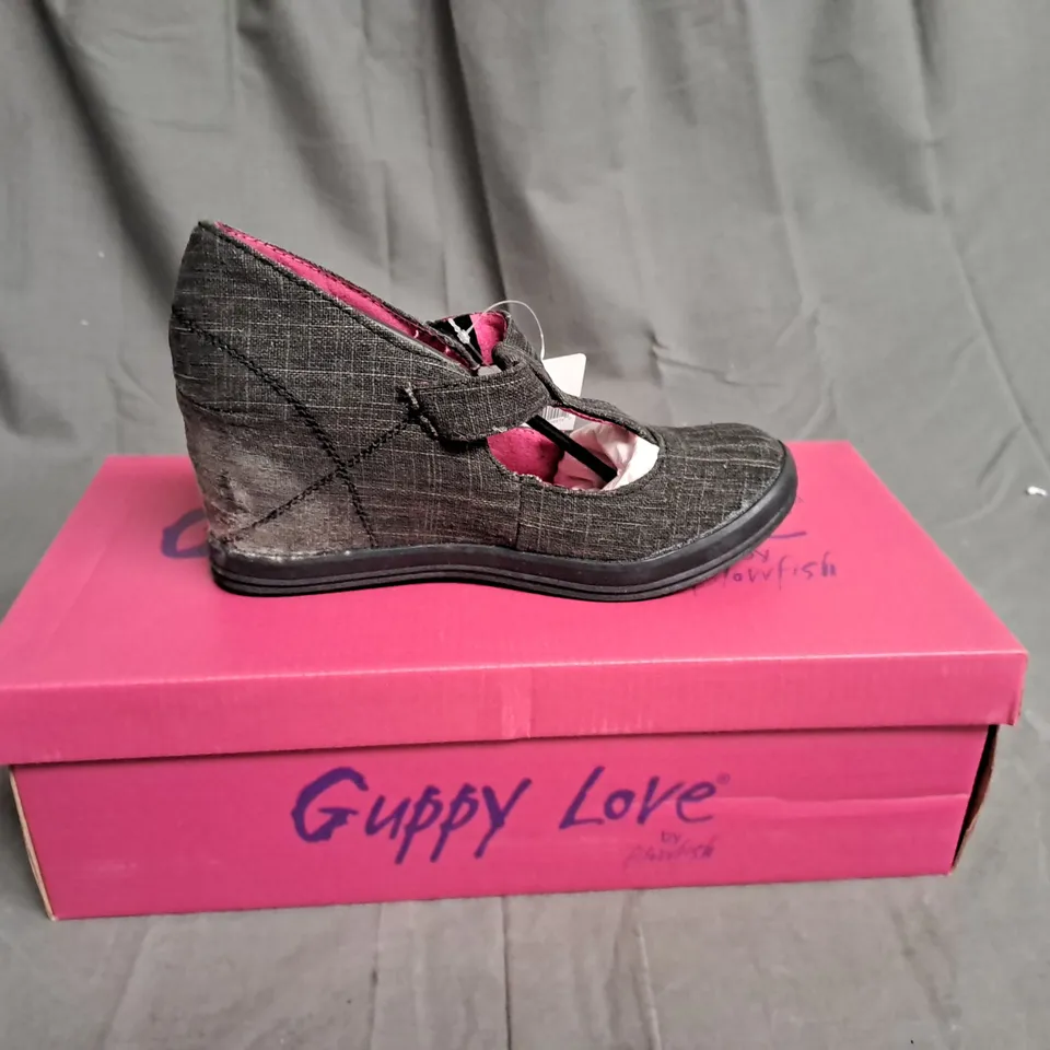 BOXED LOT OF 12 PAIRS OF LADIES WEDGE HEEL SHOES. VARIOUS SIZES