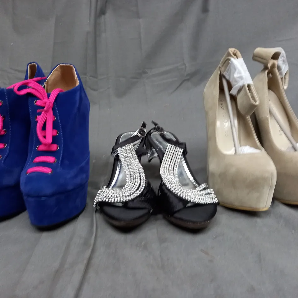 A BOX OF APPROX 20 PAIRS OF SHOES. THREE INCLUDE PINK AND BLUE HIGH HELS, BLACK SPARKLY FLAT HEELS, AN BEIGE HEELS