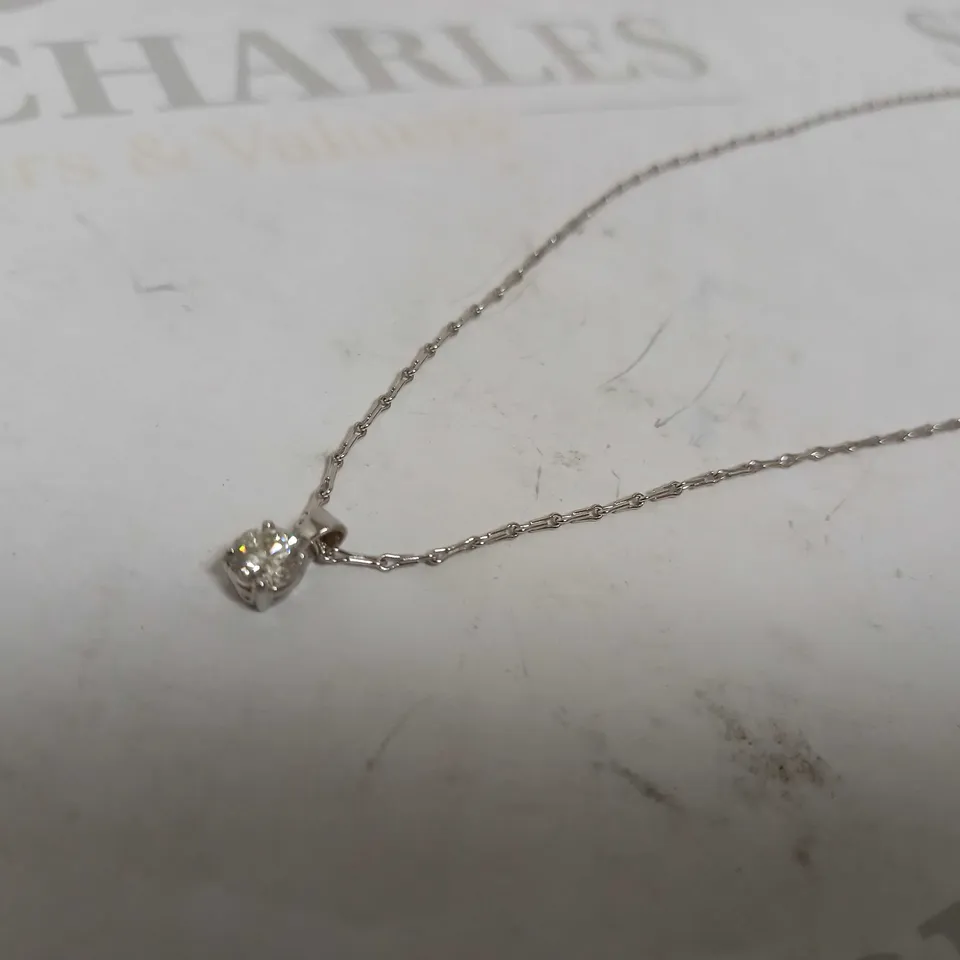 DESIGNER 18CT WHITE GOLD PENDANT ON CHAIN SET WITH A DIAMOND WEIGHING +-0.52CT