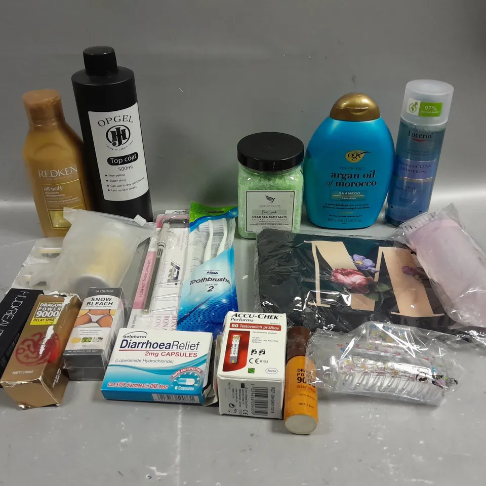 BOX OF APPROXIMATELY 15 COSMETIC ITEMS TO INCLUDE OGX SHAMPOO, OPGEL TOP COAT, REDKEN SHAMPOO , ETC
