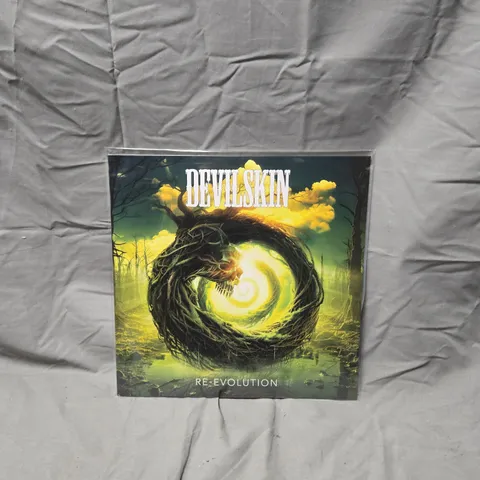 DEVILSKIN – RE-EVOLUTION VINYL LP (TRANSPARENT DARK GREEN)