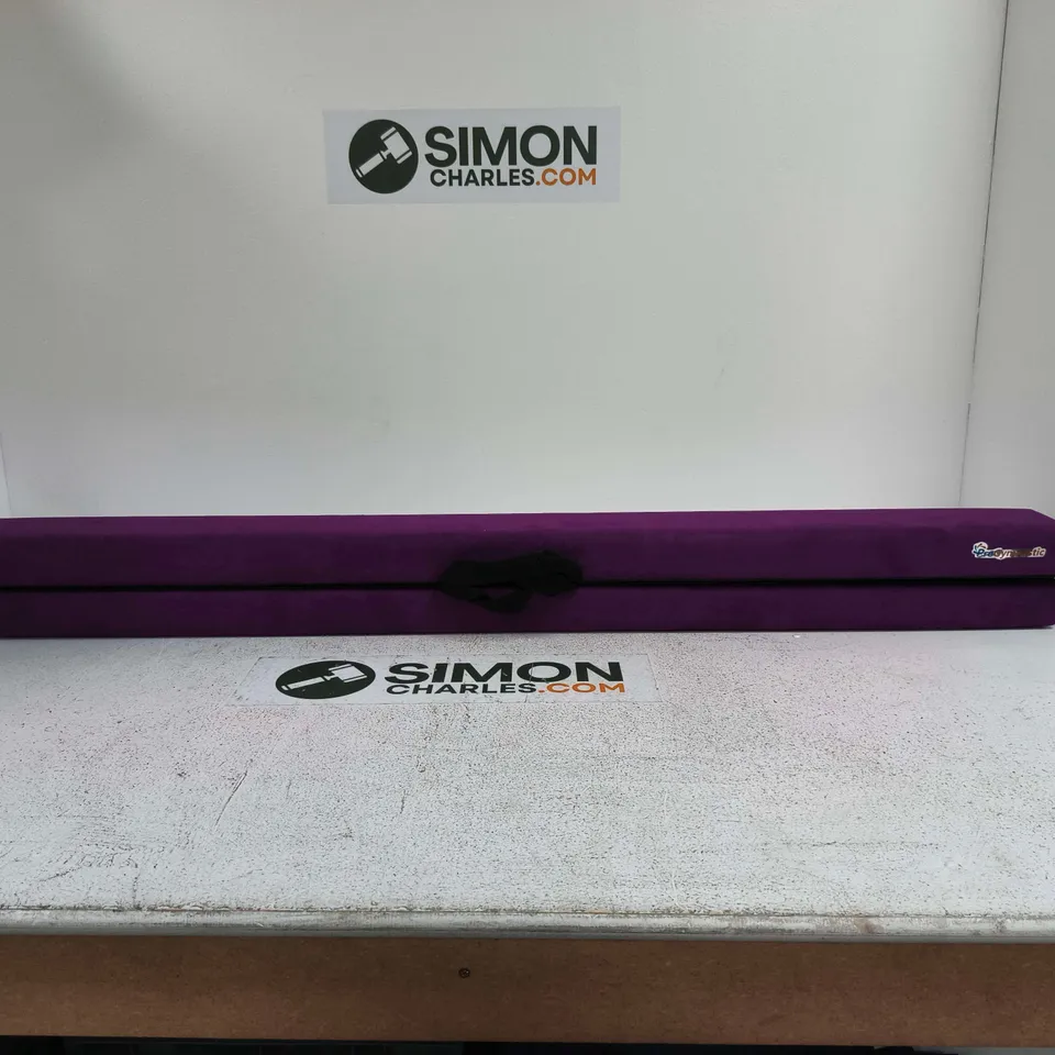 FOLDED PURPLE GYMNASTICS BALANCE BEAM IN CARRY BAG
