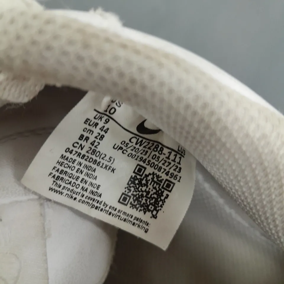 PAIR OF NIKE AIR FORCE TRAINERS IN WHITE (ODD SIZES - 1 SIZE UK 8, 1 SIZE UK 9)