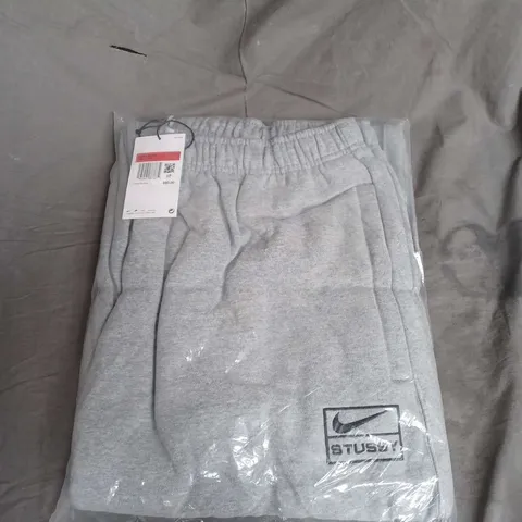 BAGGED NIKE STUSSY UNISEX CASUAL JOGGERS IN GREY SIZE L