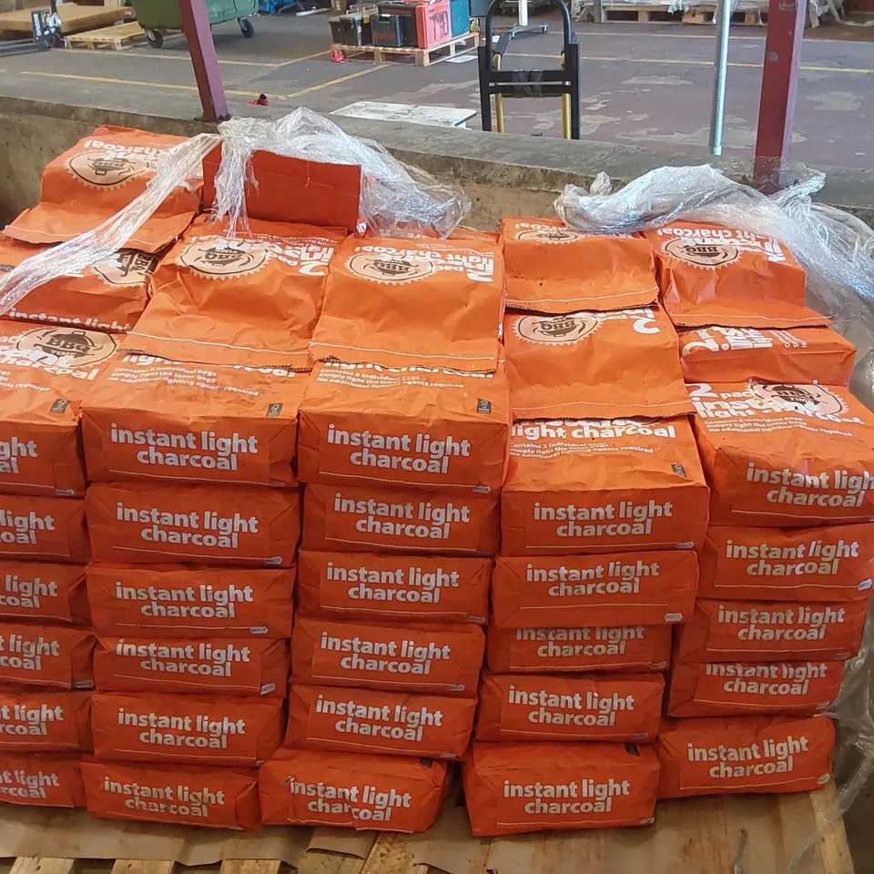 PALLET CONTAINING A LARGE QUANTITY OF CHARCOAL BRIQUETTE BAGS 