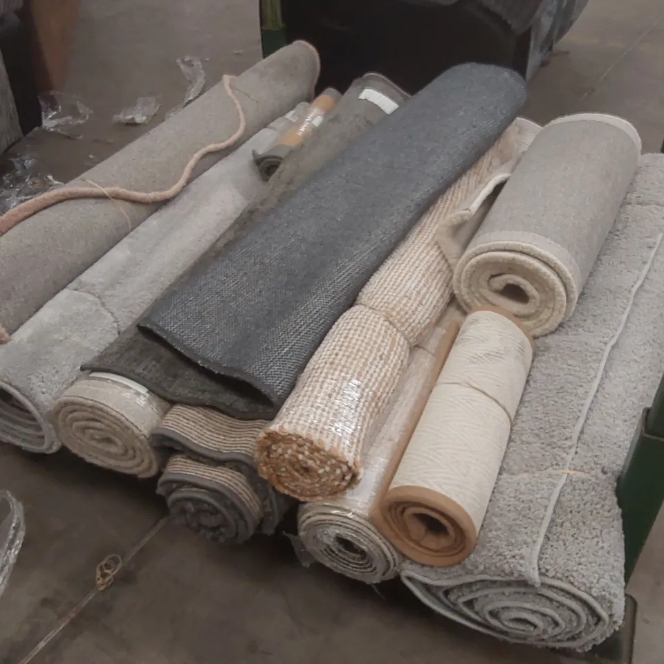 STILLAGE CONTAINING APPROXIMATELY 12x ASSORTED DESIGNER AREA RUGS // STILLAGE NOT INCLUDED