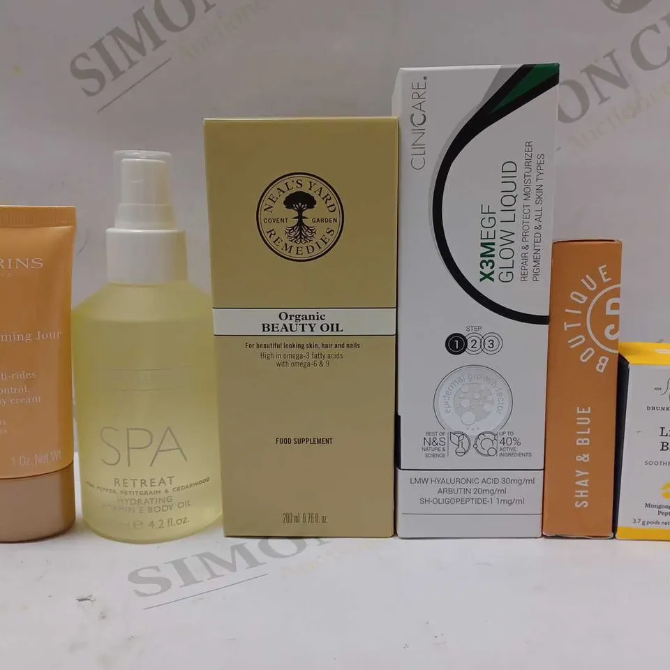 LOT OF APPROX 6 ASSORTED BEAUTY PRODUCTS TO INCLUDE NEAL'S YARD REMEDIES ORGANIC BEAUTY OIL, THE WHITE COMPANT SPA RETREAT BODY OIL, DRUNK ELEPHANT LIPPE BALM, ETC 