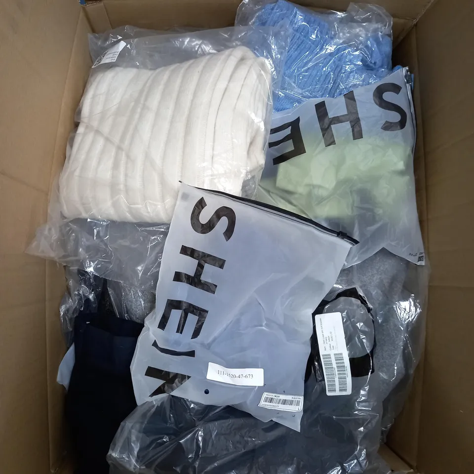 LARGE BOX OF ASSORTED CLOTHING ITEMS IN VARIOUS COLOURS AND SIZES INCLUDING TROUSERS , TOPS AND JUMPERS 