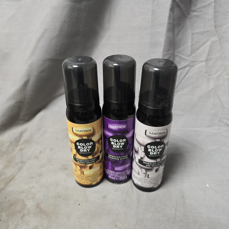 APPROXIMATELY 20 ASSORTED MATRIX BLOW DRY SPRAYS TO INCLUDE ASH BLONDE, BLOOMING ORCHID, GOLDEN BLONDE, ETC - COLLECTION ONLY