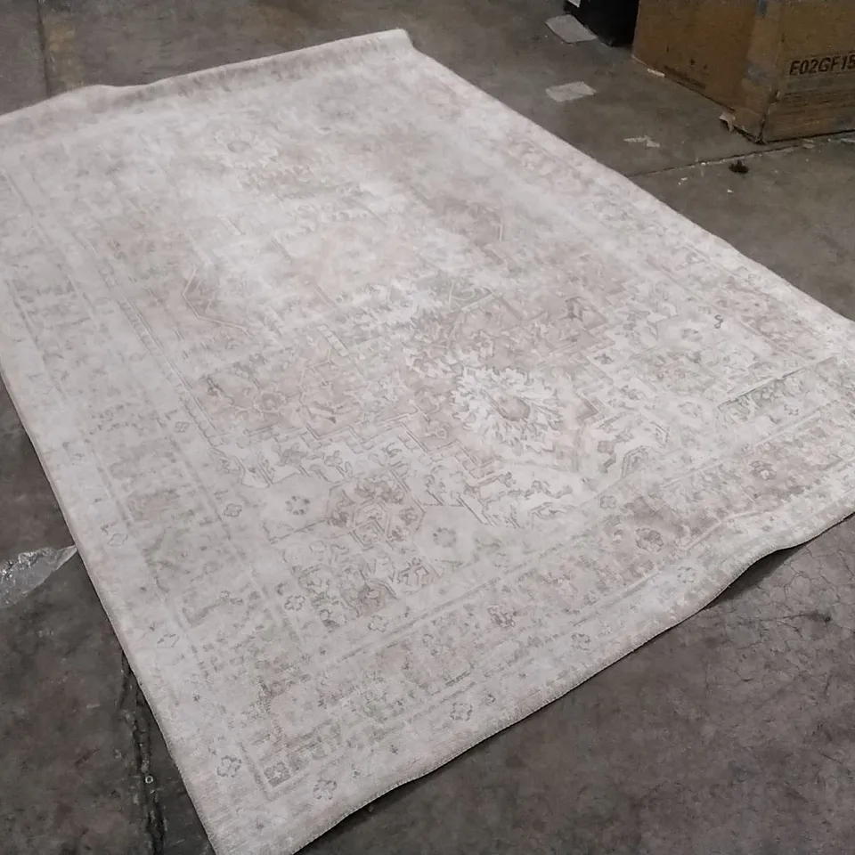 STILLAGE OF APPROXIMATELY 12 DESIGNER RUGS