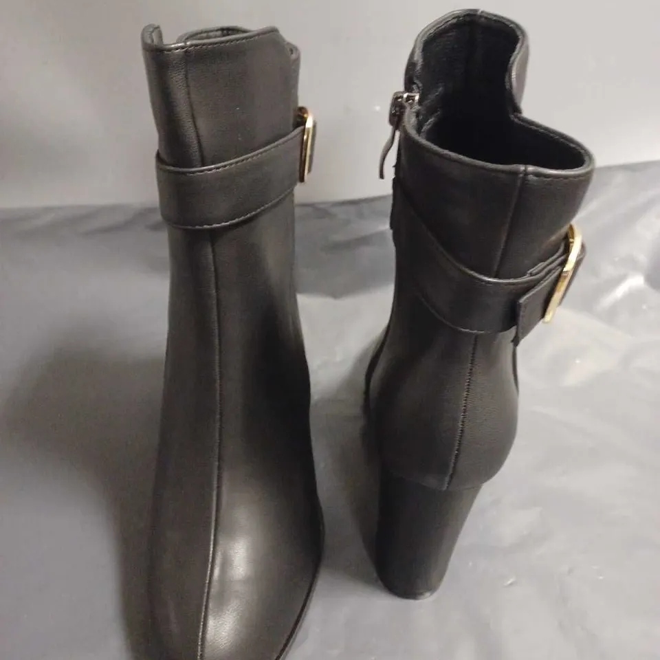 PAIR OF BUCKLE DETAIL BLACK BOOTS - 38