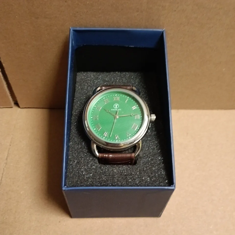BOXED TALIS CO. WRISTWATCH – GREEN DIAL WITH ROMAN NUMERALS, BROWN LEATHER STRAP