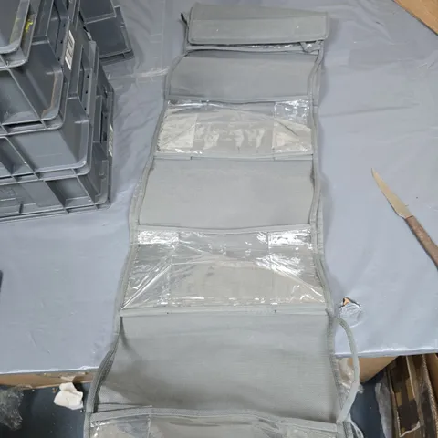 GREY ROLL-UP STORAGE ORGANISER WITH CLEAR POCKETS (VERIFY MODEL)