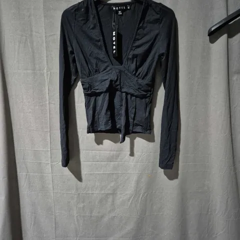 APPROXIMATELY 25 SORTED ITEMS YELLOW ONESIE BLACK TOP AND MATCHING TRACKSUIT   