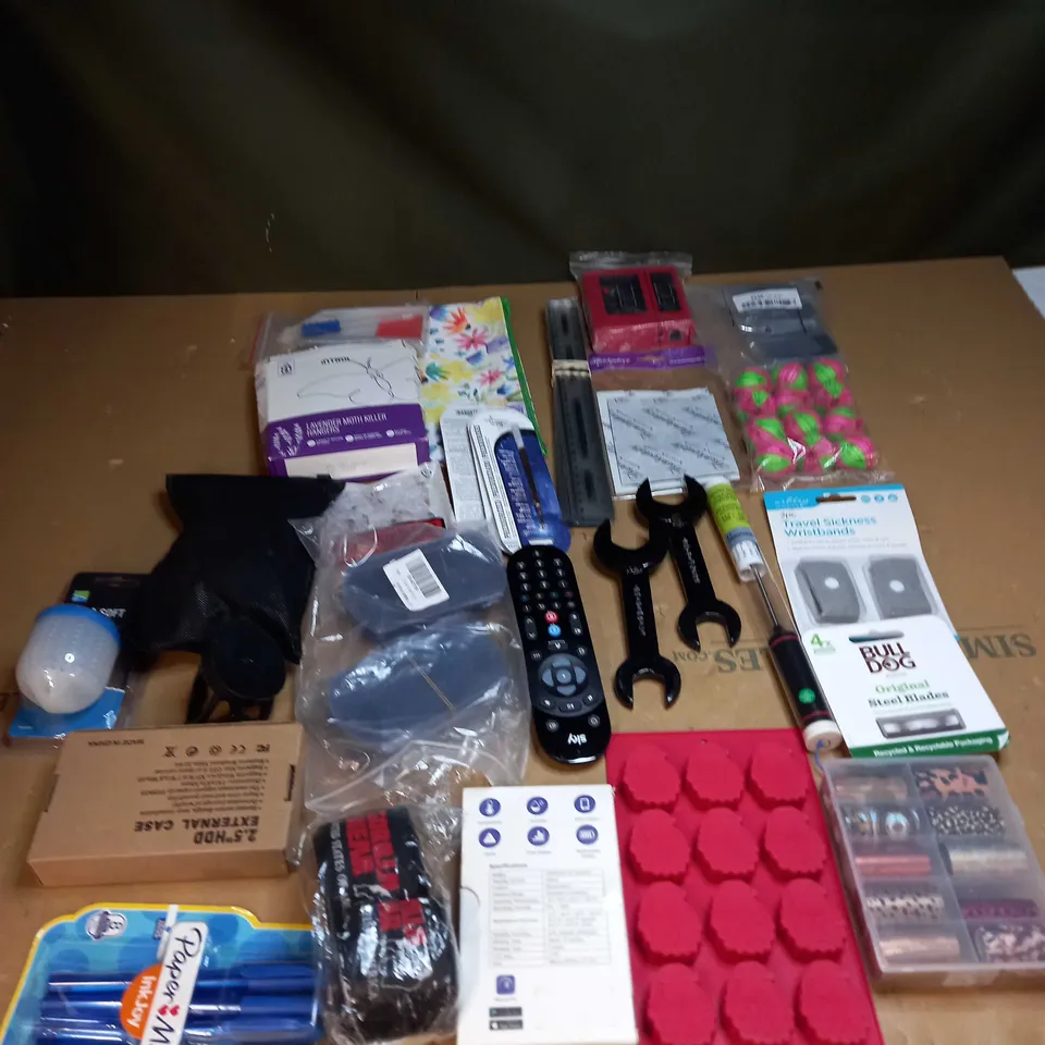 LOT OF ASSORTED ITEMS TO INCLUDE REMOTE CONTROLS, STEEL BLADES AND SPANNERS