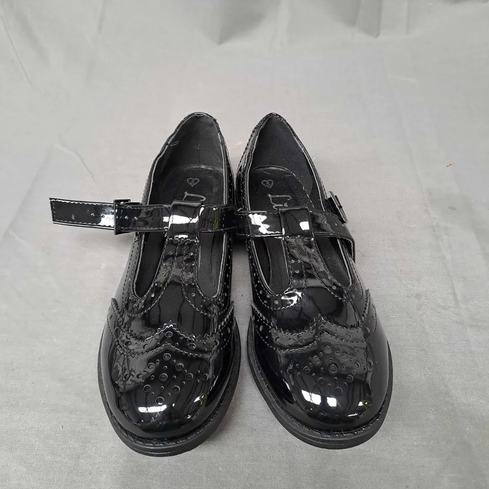 BOX OF APPROXIMATELY 12 PAIRS OF GIRLS SCHOOL SHOES IN BLACK - VARIOUS SIZES