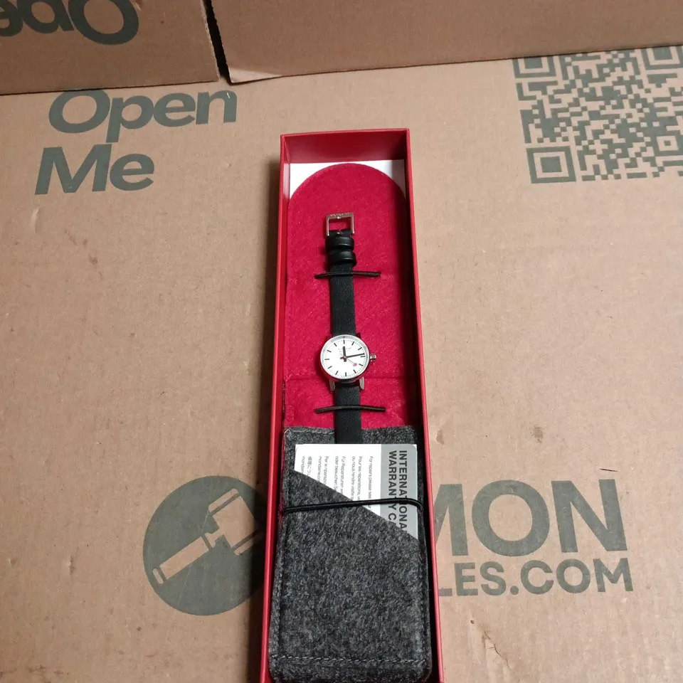 MONDAINE SWISS WATCH – WHITE DIAL, BLACK LEATHER STRAP, BOXED