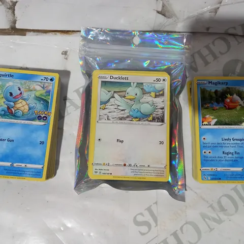 LOT OF ASSORTED POKΓMON TRADING CARDS