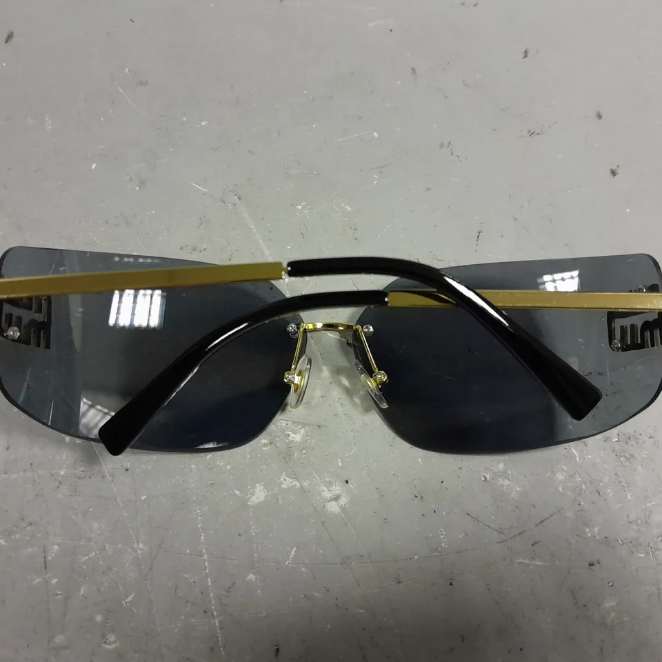 MIU MIU RIMLESS LOGO FRAMED SUNGLASSES