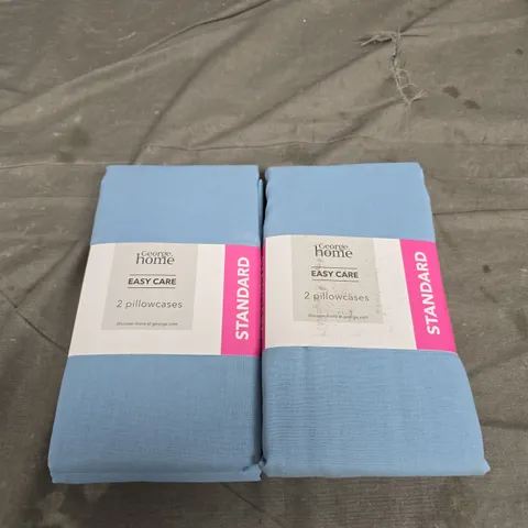 BOX OF APPROX 25 ASSORTED EASY CARE BLUE PILLOW CASES 