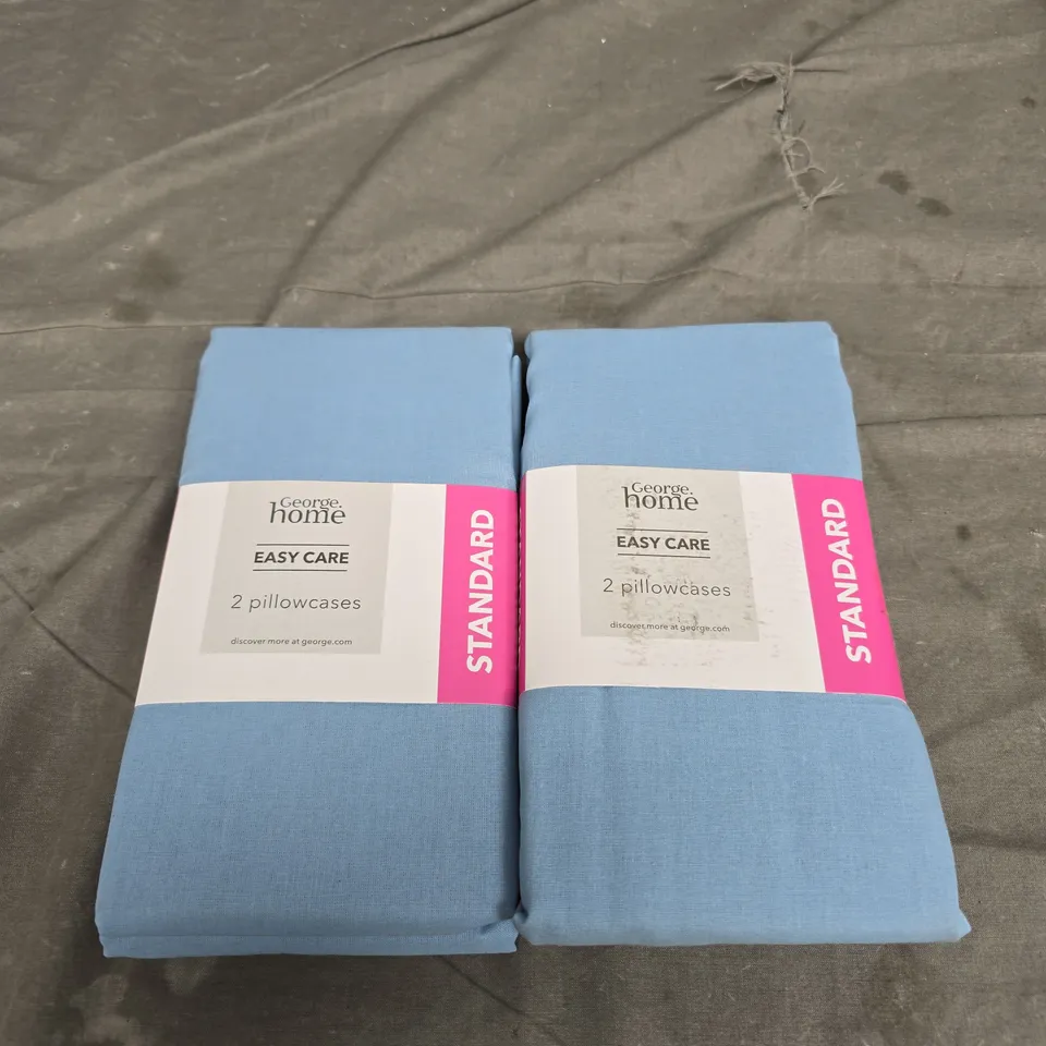 BOX OF APPROX 25 ASSORTED EASY CARE BLUE PILLOW CASES 