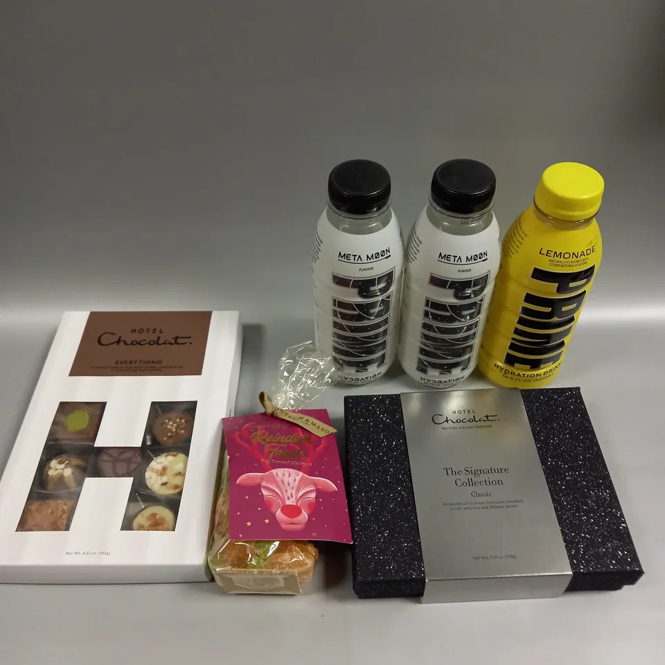 APPROXIMATELY 7 ASSORTED FOOD & DRINK PRODUCTS TO INCLUDE PRIME HYDRATION DRINKS, HOTEL CHOCOLAT SIGNATURE COLLECTION, REINDEER TREATS ETC 