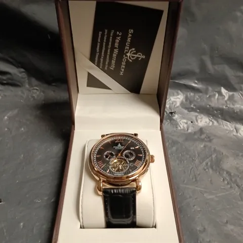 SAMUEL JOSEPH AUTOMATIC WRISTWATCH WITH BLACK DIAL AND SKELETON MOVEMENT