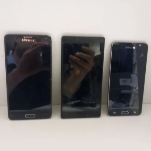 THREE ASSORTED MOBILE PHONES TO INCLUDE; SAMSUNG AND ARCHOS