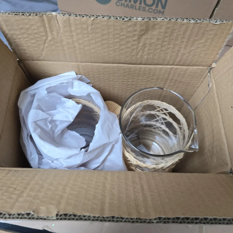 LOT OF 2 GISELA GRAHAM LARGE GLASS JUGS WITH RATTAN STYLE DECOR