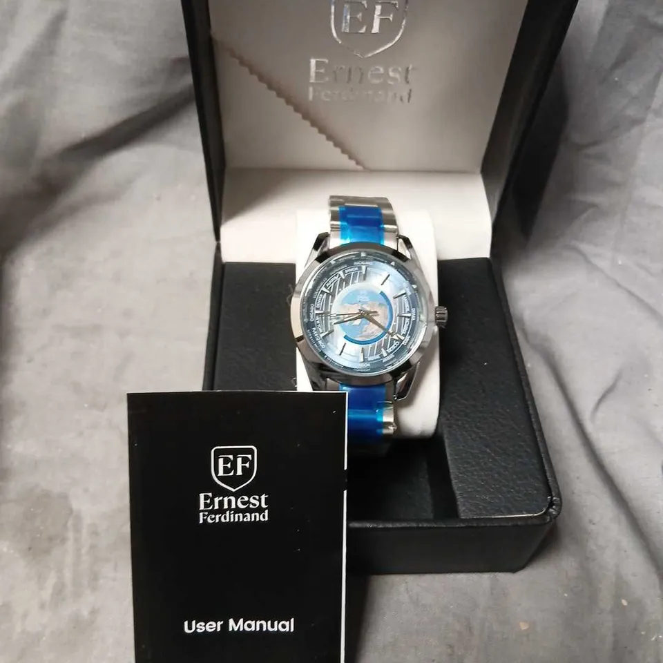 ERNEST FERDINAND WORLD TIME WRISTWATCH – STAINLESS STEEL, BLUE ACCENTS, BOXED